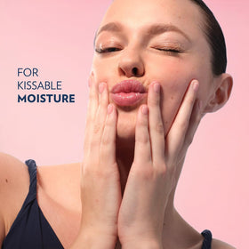 Vaseline rosy lips size comparison next to coin illustrating compact portability