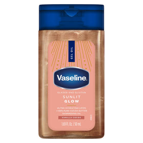 Vaseline bottle in hand illustrating travel-ready size and convenience