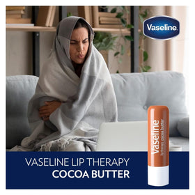 close-up of Vaseline balm texture showing glossy protective finish for softer lips