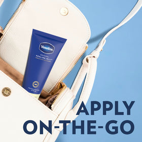 Vaseline tube held in hand showing portable size and easy squeeze