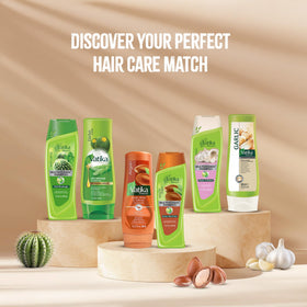 Vatika Naturals bottles beside a hand to show 400ml size and long-lasting benefit