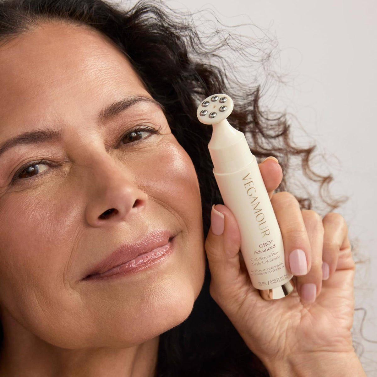 VEGAMOUR applicator close-up highlighting precision tip for targeted placement