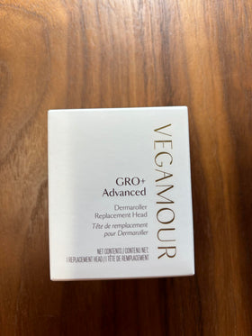 VEGAMOUR product packaging and label closeup showing brand and replacement instructions