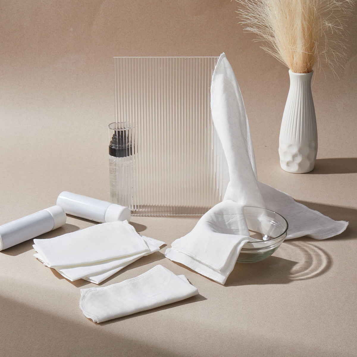 Velmitten cloths styled in a bathroom setting to show tidy skincare routine benefit