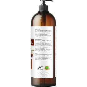 golden jojoba oil drop on fingertip showing lightweight texture