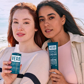 VERB product in hand applying mist to hair for detangling and smoothing benefit