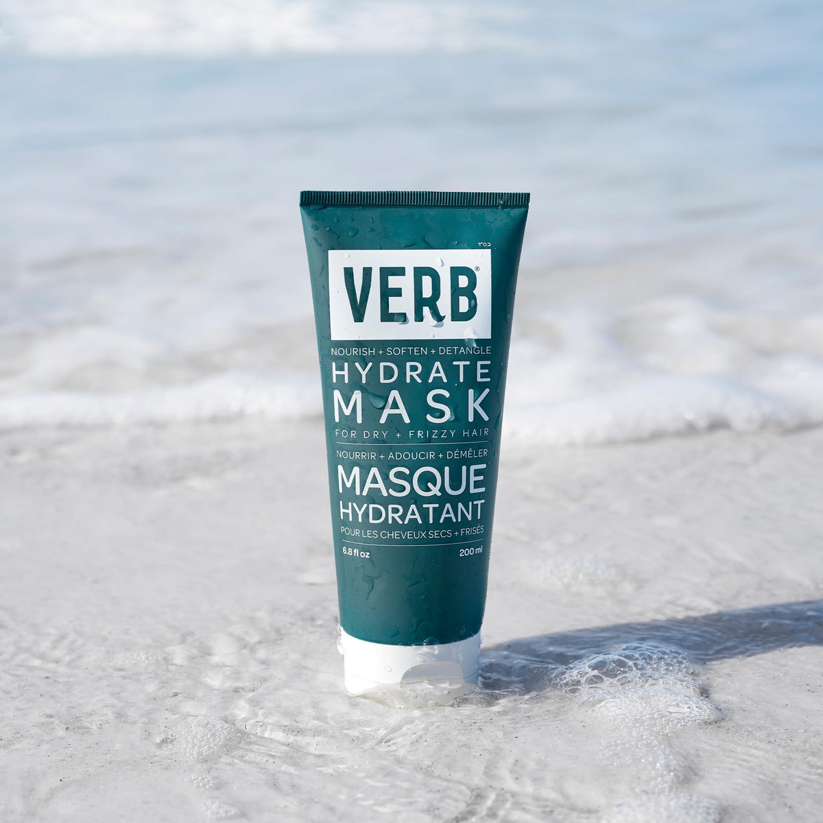 VERB Hydrate Mask next to a ruler for size comparison conveying the 6.8 fl oz capacity
