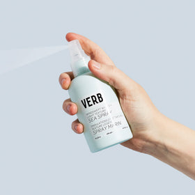 VERB close-up of mist spray emitting fine cloud for light, even application