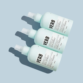 VERB bottle in hand to show size and portability for on-the-go styling