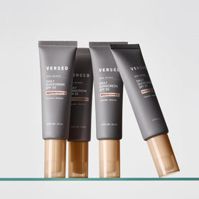 Versed 1.7 oz tube next to hand for clear size and travel-friendly benefit