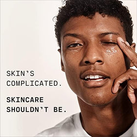 Versed Skin Soak held in hand to show 1.5 oz size for travel-friendly, portable moisturizing