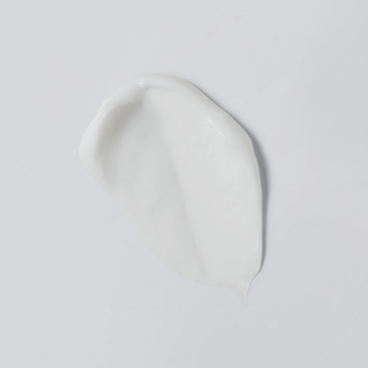 Versed cream texture close-up demonstrating lightweight, smoothing hydration