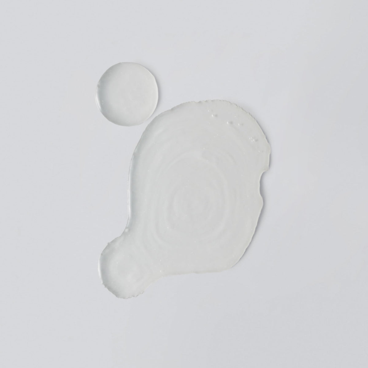 Versed milky texture close-up illustrating fast-absorbing hydration benefit