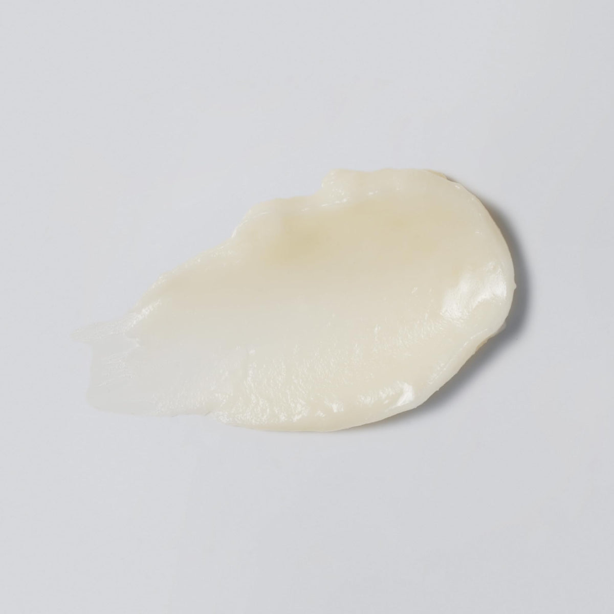 Versed melted balm texture close-up demonstrating rich hydration benefit
