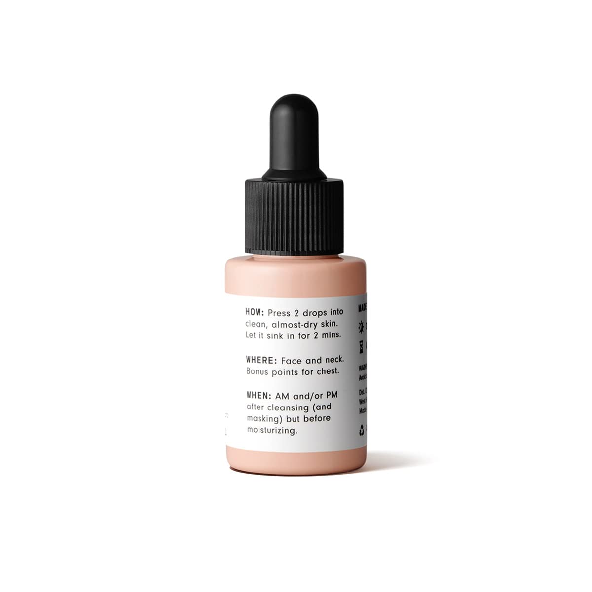 Versed dropper dispensing serum drop demonstrating precise application and control