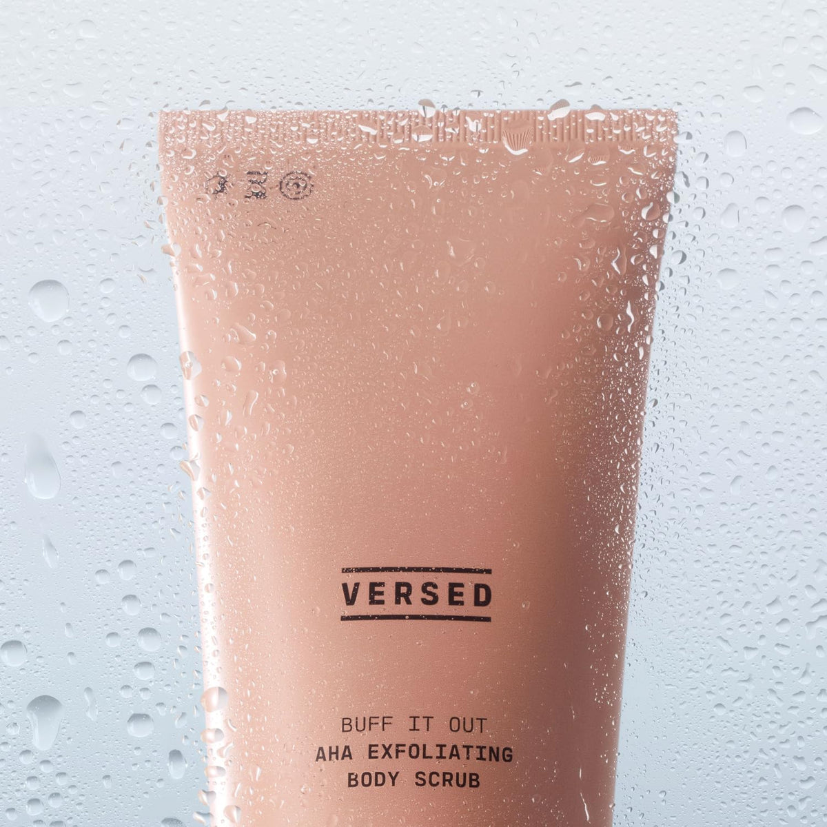 Versed cream texture close-up illustrating smooth exfoliant