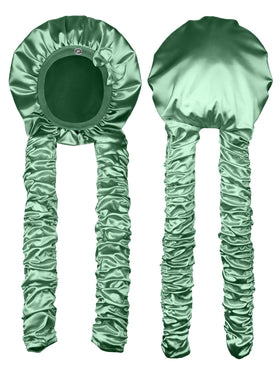 Vettres front view of green satin bonnet shows fit and secure band benefit