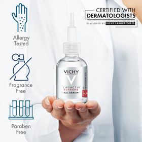 Vichy bottle held in hand for scale showing travel-friendly size benefit