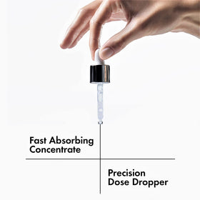Vichy bottle in hand scale comparison showing compact travel-friendly size