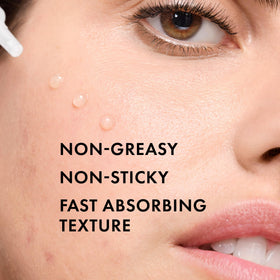 VICHY Normaderm in hand to illustrate 1.01 fl oz size and portability