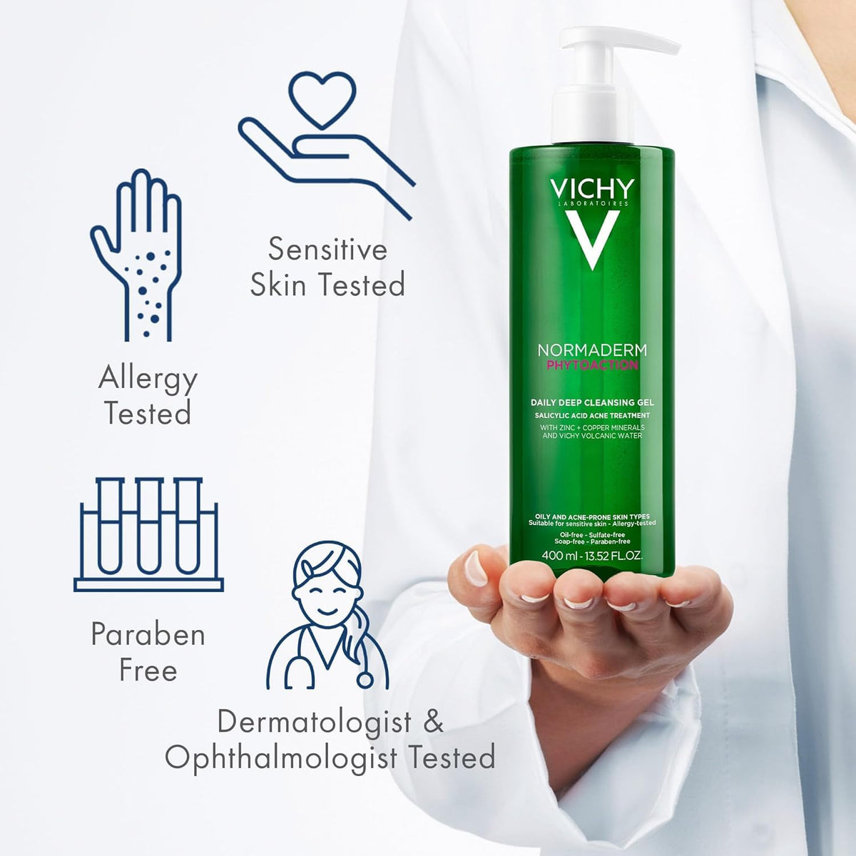 VICHY Normaderm next to hand to show bottle size and scale