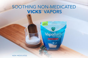 Vicks VapoBath dissolving in bathtub steam with aromatherapy benefit