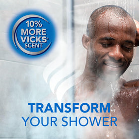 Vicks VapoShower PLUS tablet dissolving on shower floor releasing soothing vapors