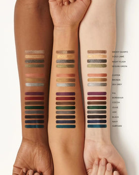 Victoria Beckham Satin Kajal Cocoa applied along lash line in lifestyle setting, smudge-resistant definition benefit