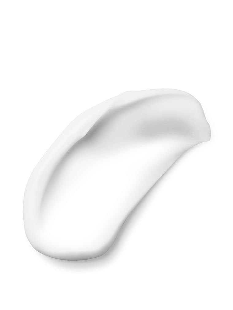 Victoria's Secret lotion on hand being spread for quick hydration and non-greasy feel