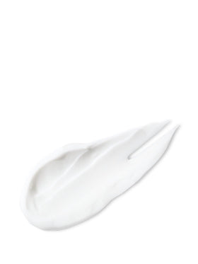 Victoria's Secret applying lotion to hand to show smooth, non-greasy finish