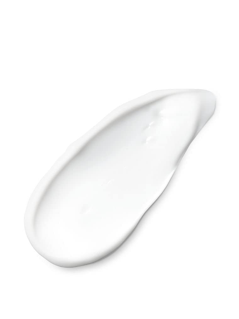 Victoria's Secret lotion applied forearm during evening routine, demonstrates lasting fragrance