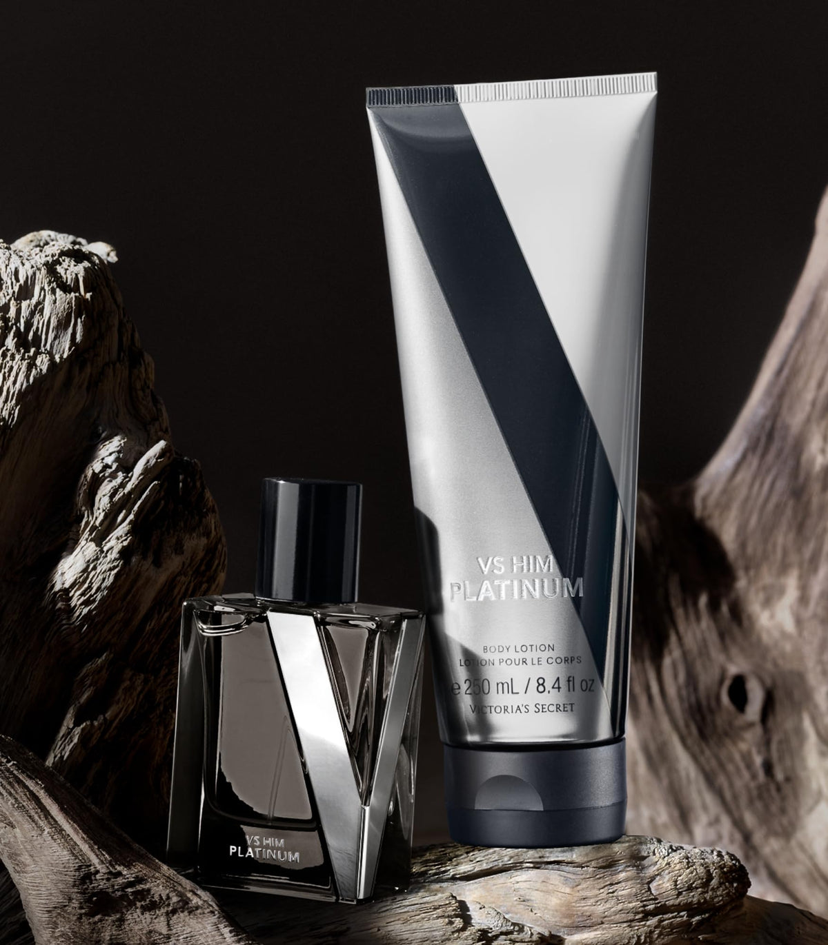 Victoria's Secret VS Him Platinum with matching cologne in lifestyle setting for layering