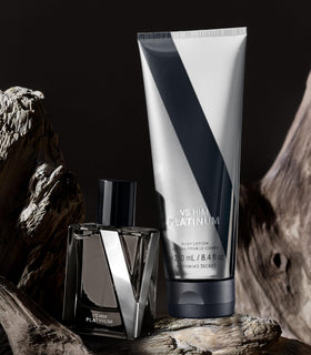 Victoria's Secret VS Him Platinum with matching cologne in lifestyle setting for layering