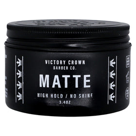 Victory Crown front tin showing matte pomade brand and clean design benefit