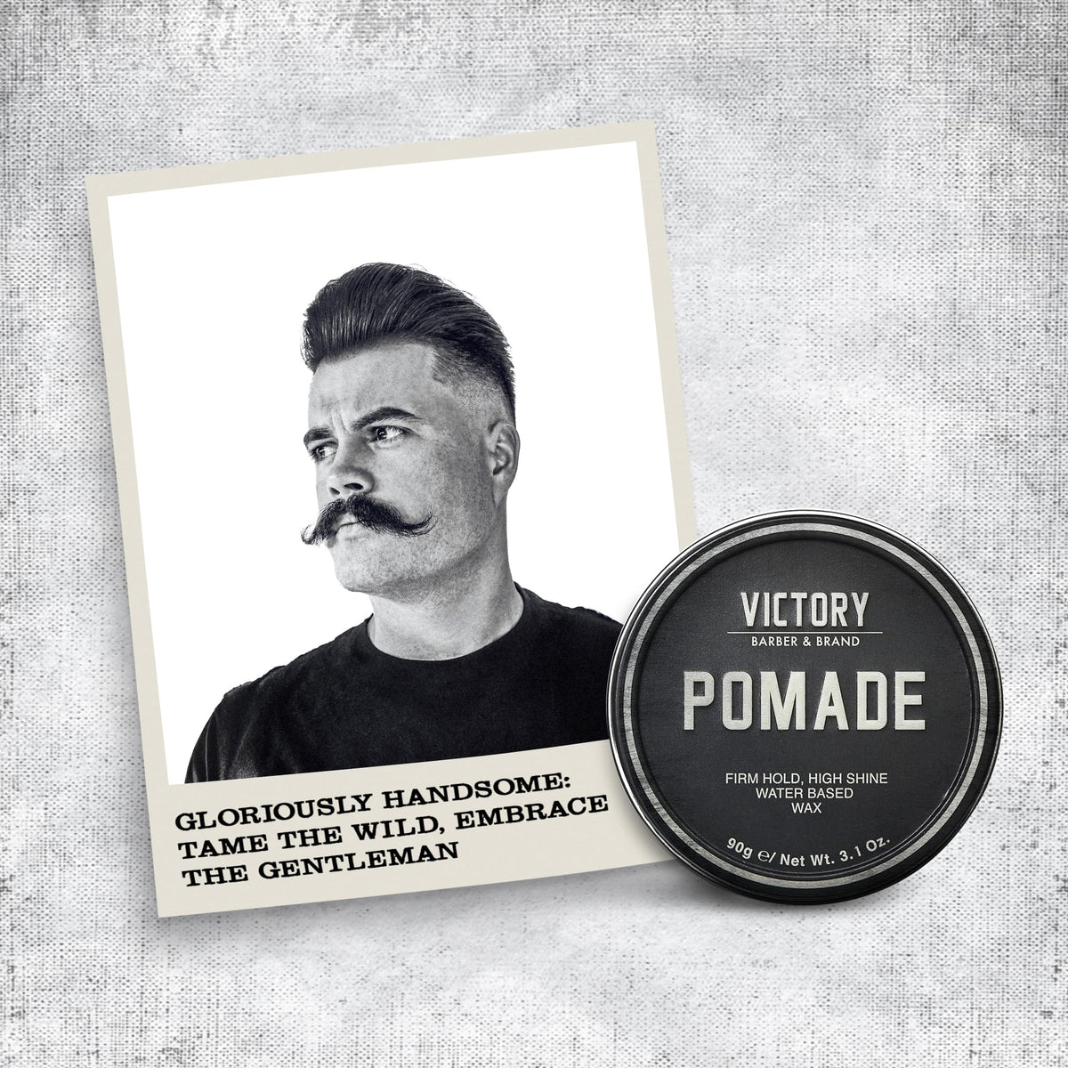 Victory Barber & Brand slicked-back hairstyle example showing high-shine finish