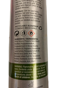 Vigorol mousse applied on curly hair improving definition and moisture