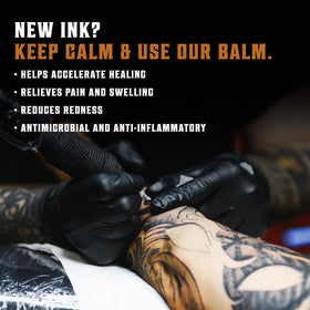 Hand applying Viking Revolution balm to skin, providing smooth application benefit