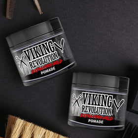 Viking Revolution applying pomade with palms demonstrating even distribution and strong hold