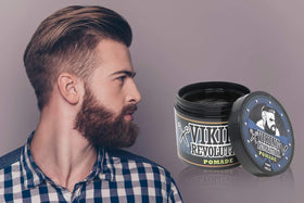 Viking Revolution pomade on hands demonstrating easy warming and quick application
