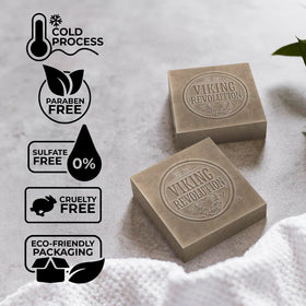 Viking Revolution soap held in hand demonstrating easy grip and nourishing lather