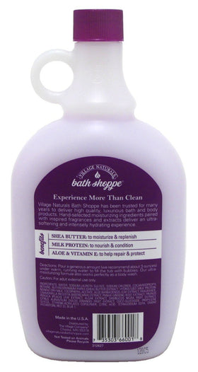 Village Naturals Therapy in bathtub lifestyle with steam, illustrating calming lavender chamomile soak