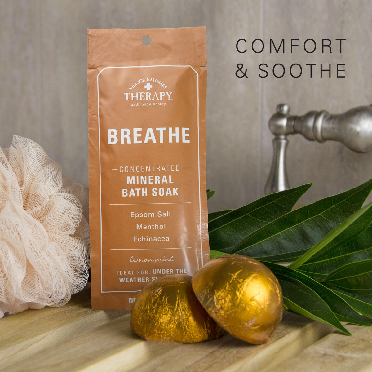 Village Naturals Therapy packets displayed on bathroom shelf creating spa-like atmosphere