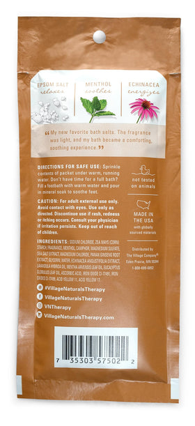Village Naturals Therapy opened packet with pale mineral soak granules for easy use