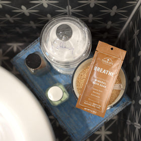 Village Naturals Therapy contents in bowl with towel for inhalation steam, quick relief