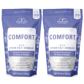 Village Naturals Therapy front packaging showing bottle and scent benefits