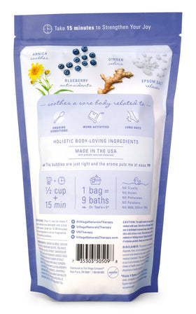 Village Naturals Therapy pouring foam into tub for a relaxing bath