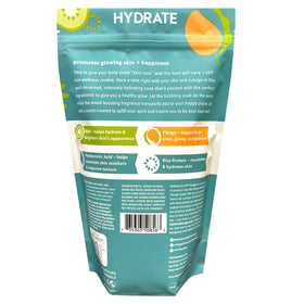 Village Naturals Therapy bottle label close-up highlighting ingredients and clarity