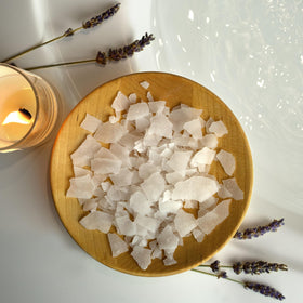 2.5 lb Village Naturals Therapy tub next to ruler to show scale and at-home storage size