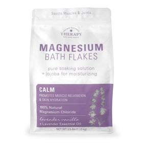 Village Naturals Therapy tub front view showing calm magnesium flakes and clear labeling for easy choice