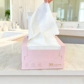 Vinda folded towel beside ruler showing dimensions and convenience
